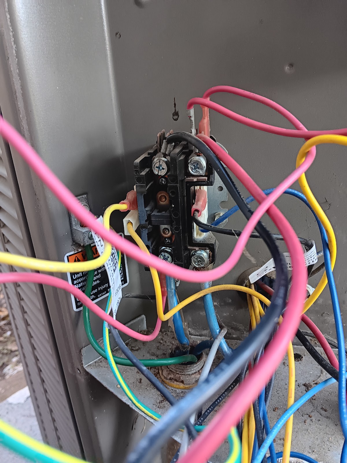 Inside AC unit wiring and components