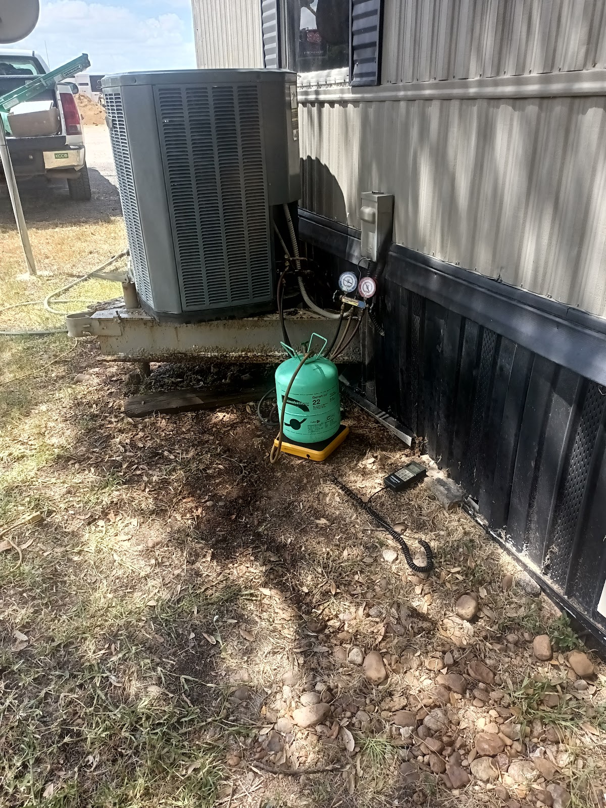 Jorge working on an outdoor AC condenser unit